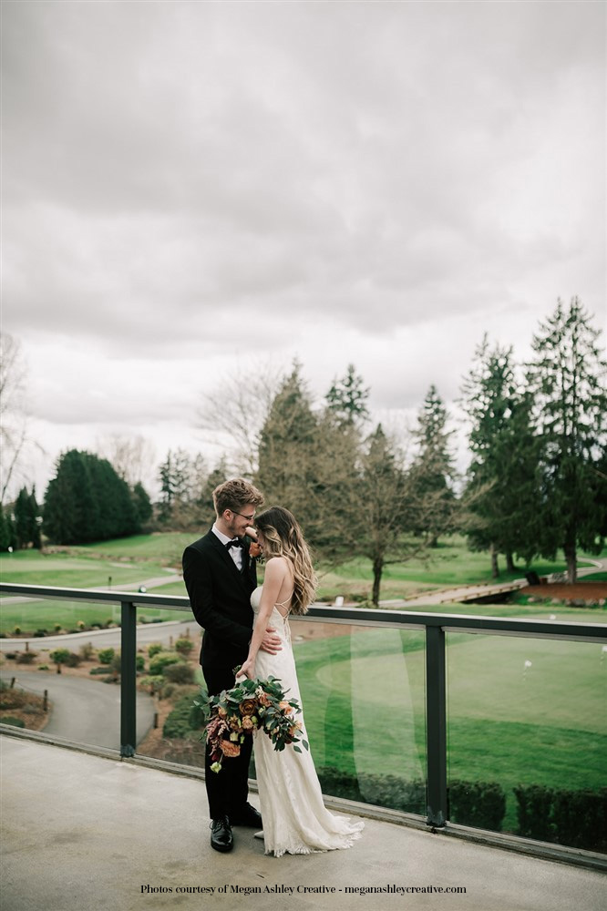 Bride-and-groom-on-a-patio-overlooking-golf-Pitt-Meadows-Golf-Club